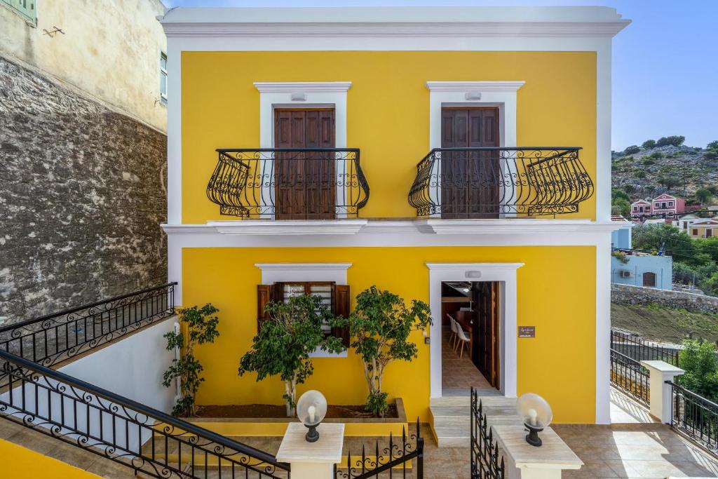Balkón nebo terasa v ubytování Symiland Villa