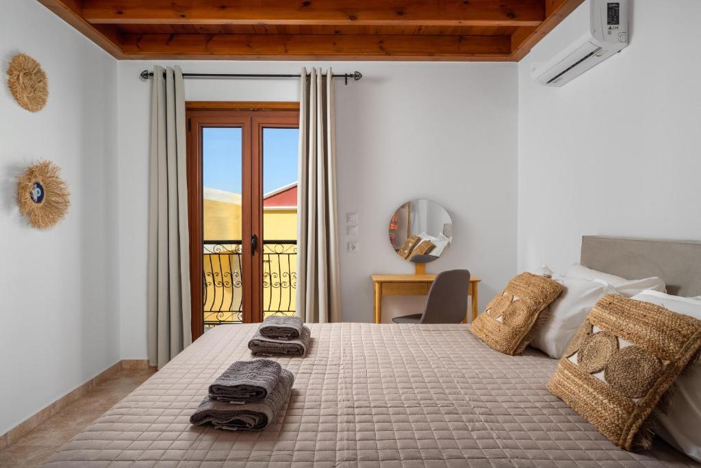 Postel nebo postele na pokoji v ubytování Symiland Villa