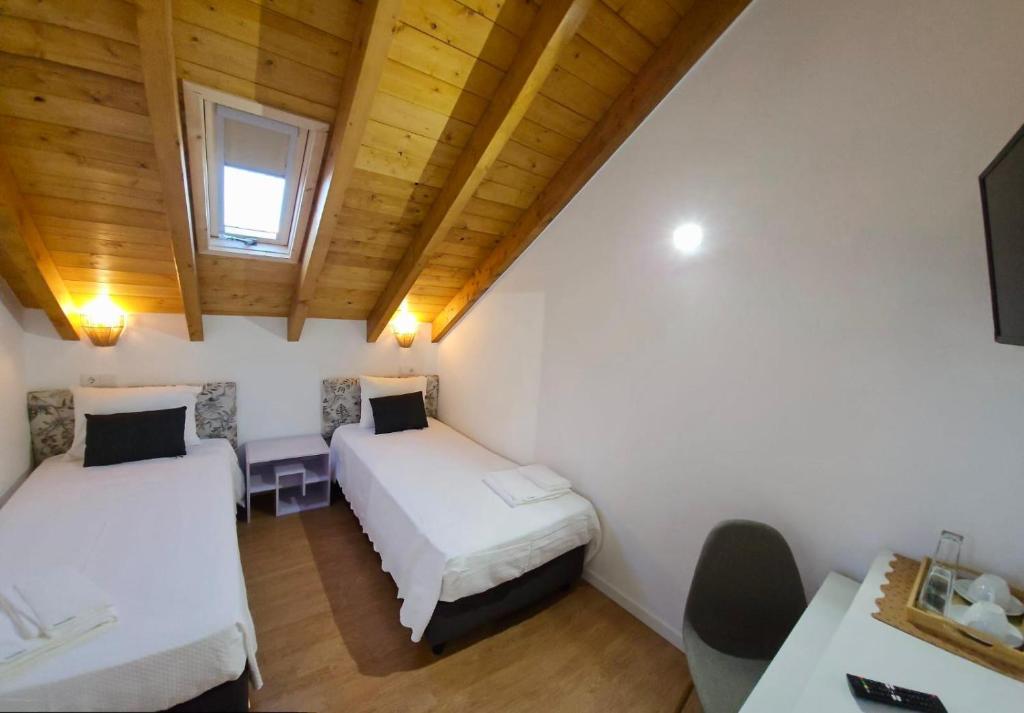 Postel nebo postele na pokoji v ubytování Casa do Chafariz - Rooms