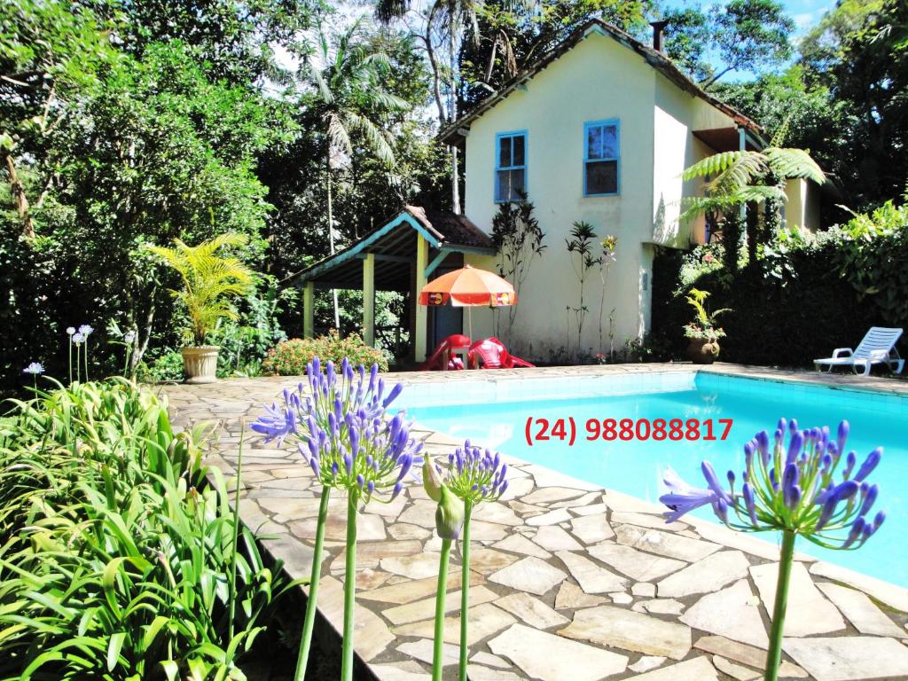 A piscina localizada em Pousada Arboretum ou nos arredores