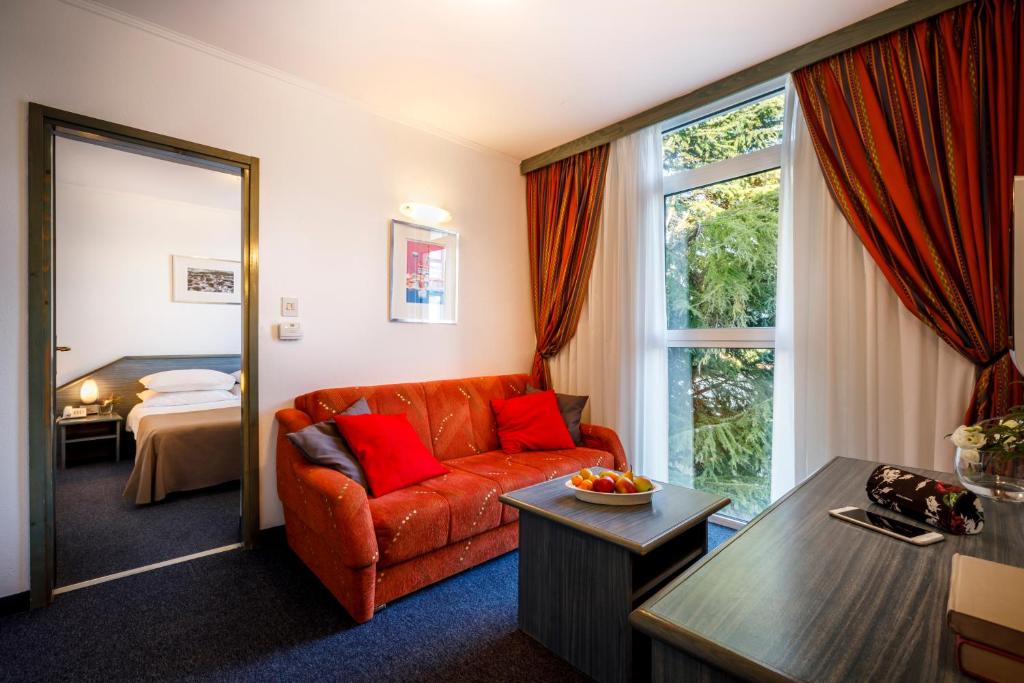 Postel nebo postele na pokoji v ubytování Laguna Maradiso Hotel by Aminess