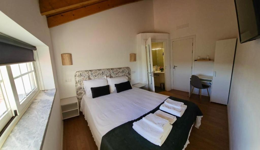 Postel nebo postele na pokoji v ubytování Casa do Chafariz - Rooms