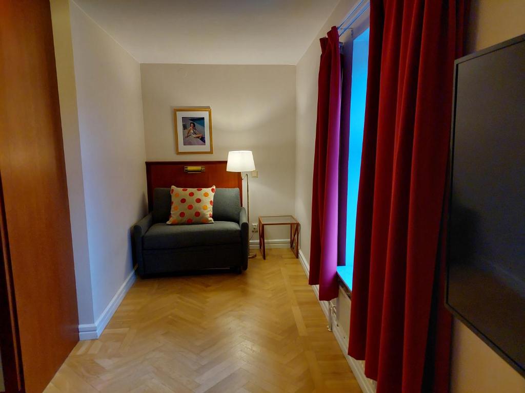 TV a/nebo společenská místnost v ubytování Hotel Bishops Arms Lund