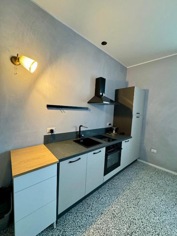 Kuchyňa alebo kuchynka v ubytovaní 4 Balconi rooms Paladini B&B e appartamenti