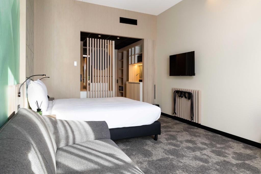 Postel nebo postele na pokoji v ubytování Hotel Waterstate