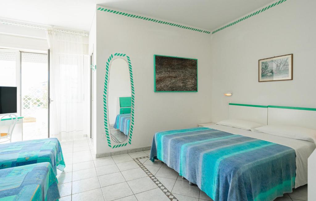 Postel nebo postele na pokoji v ubytování Hotel Marconi