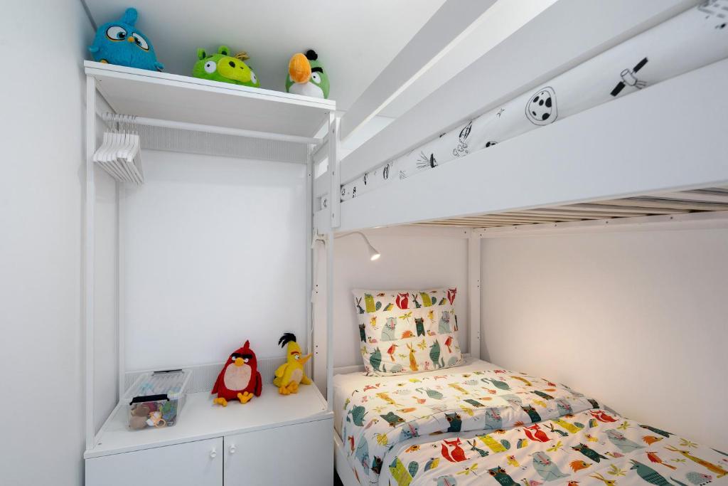 Postel nebo postele na pokoji v ubytování V L P Amorim