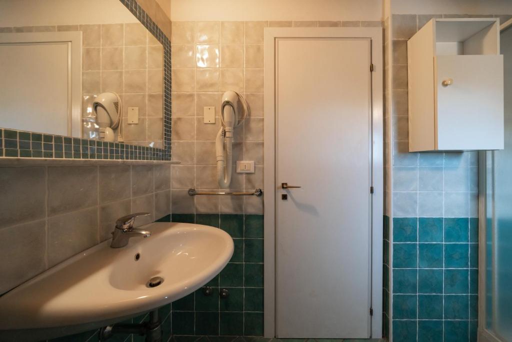 Koupelna v ubytování Hotel Marconi