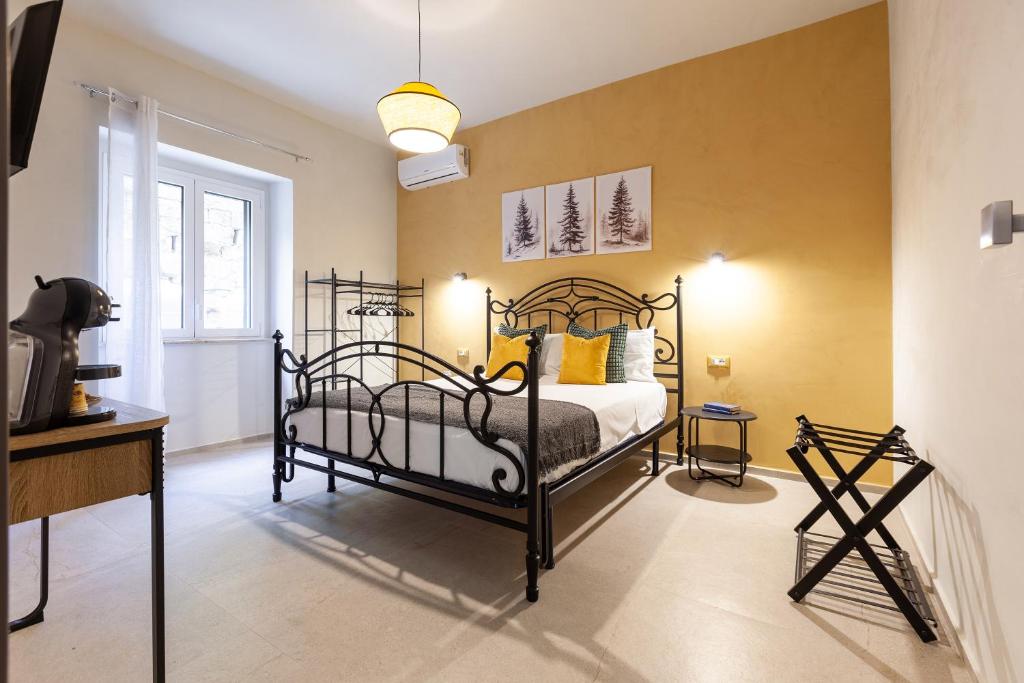 Postel nebo postele na pokoji v ubytování Malva Rooms