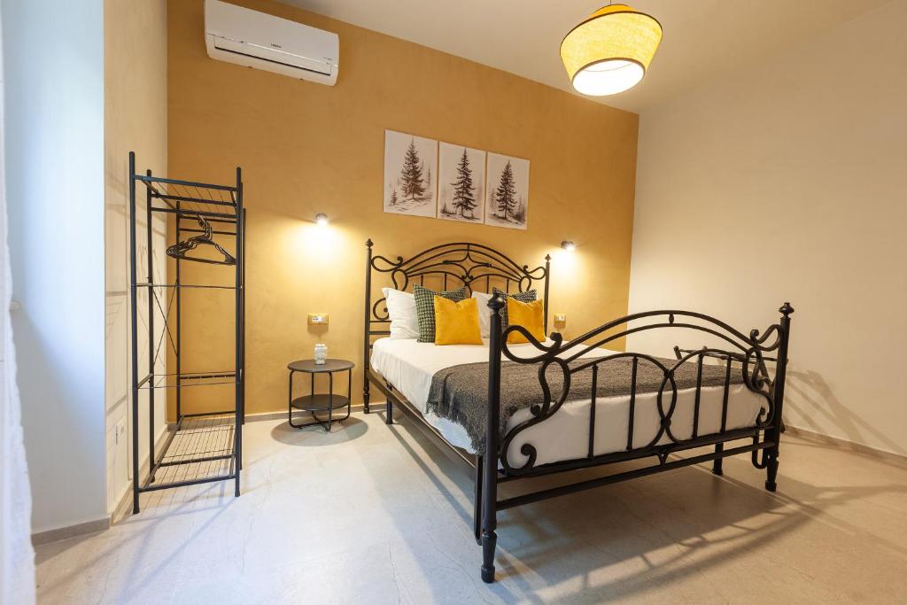 Postel nebo postele na pokoji v ubytování Malva Rooms