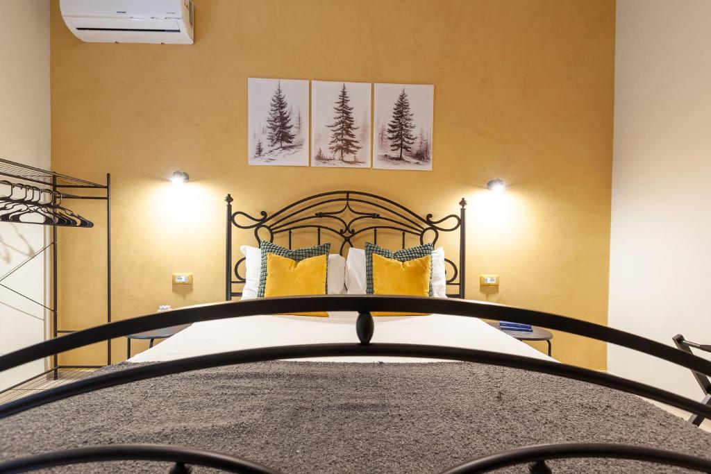 Postel nebo postele na pokoji v ubytování Malva Rooms