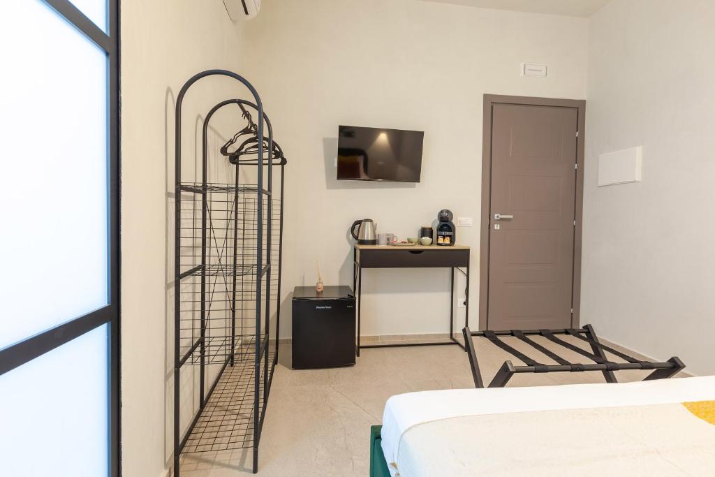 Postel nebo postele na pokoji v ubytování Malva Rooms