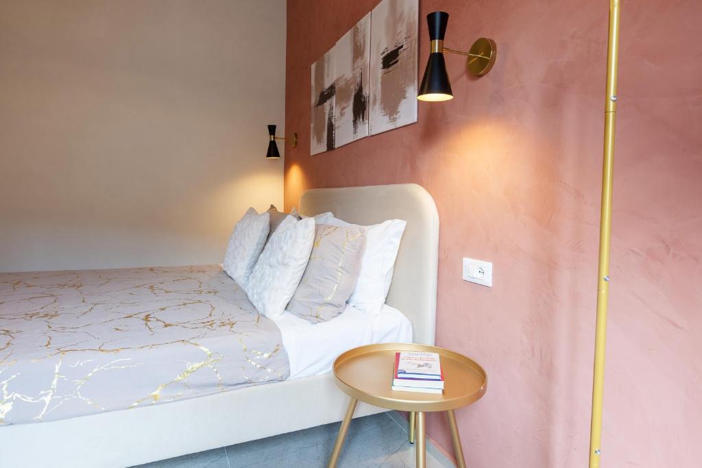Postel nebo postele na pokoji v ubytování Malva Rooms