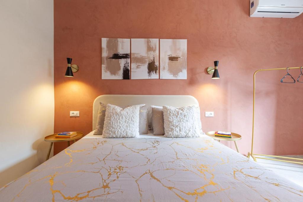 Postel nebo postele na pokoji v ubytování Malva Rooms