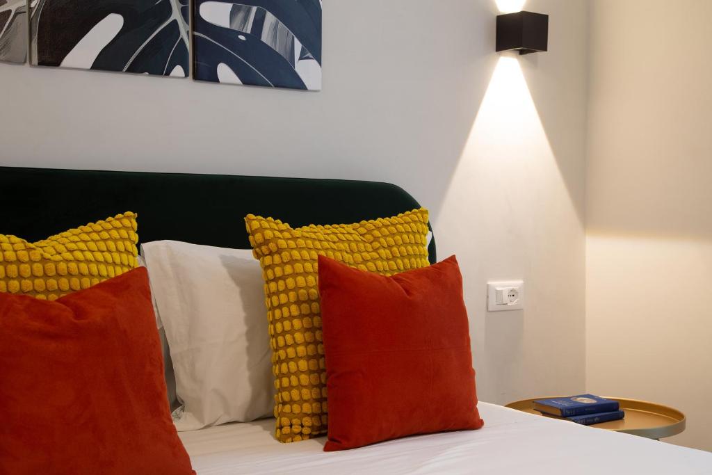 Postel nebo postele na pokoji v ubytování Malva Rooms