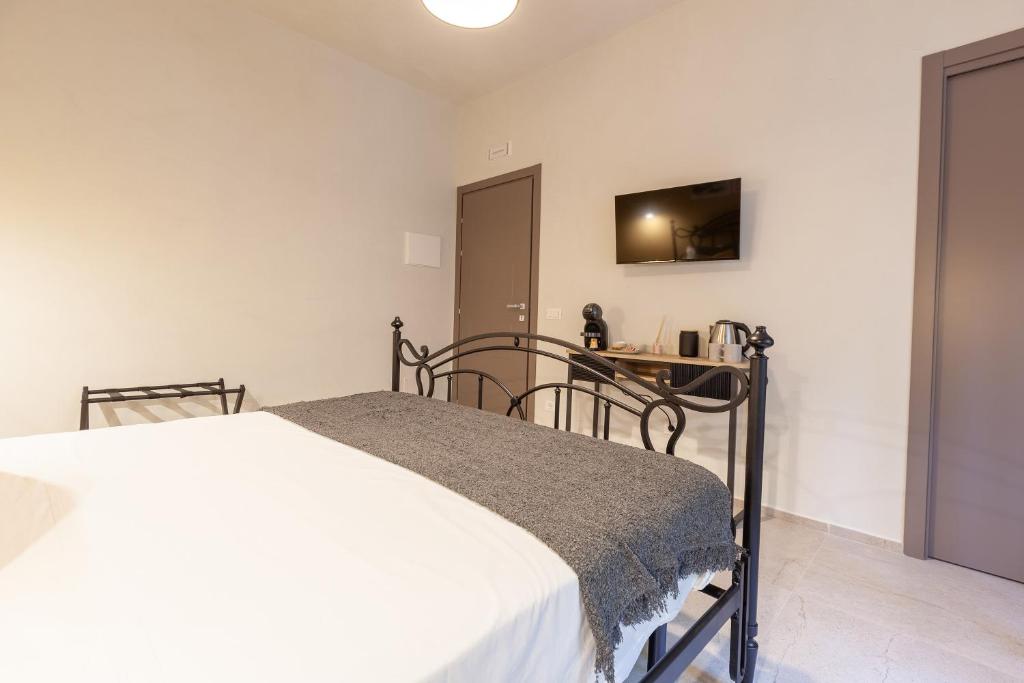 Postel nebo postele na pokoji v ubytování Malva Rooms