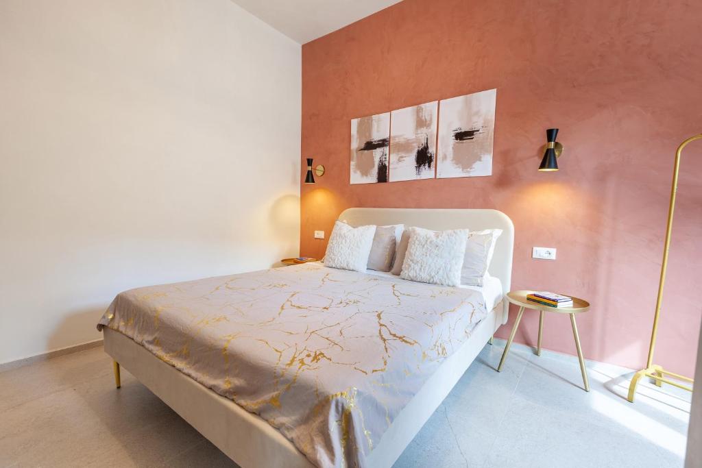 Postel nebo postele na pokoji v ubytování Malva Rooms