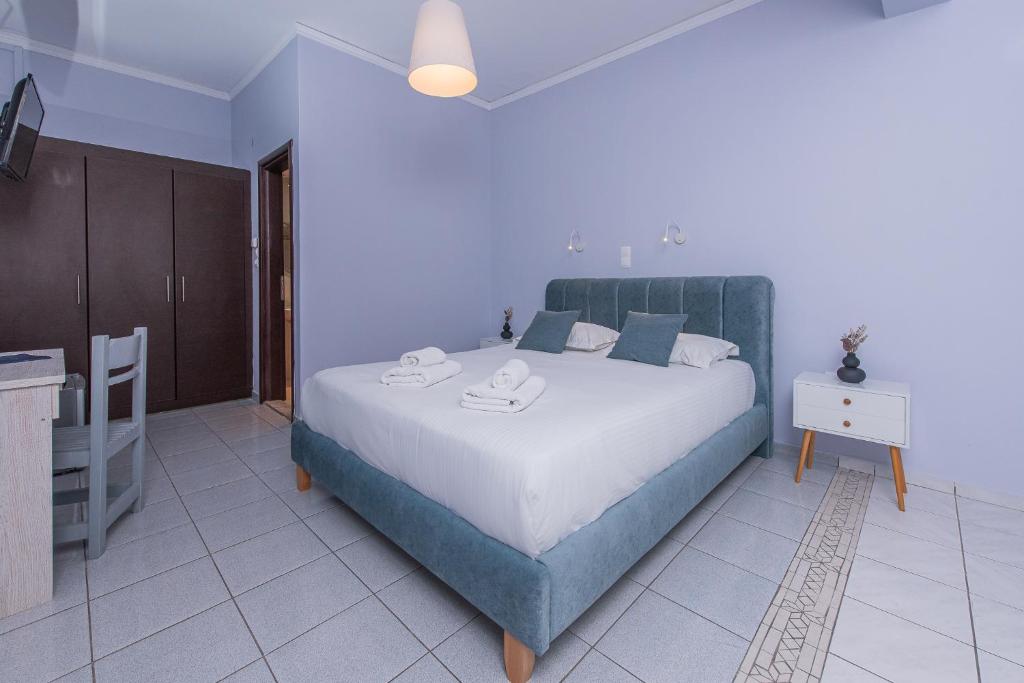 Postel nebo postele na pokoji v ubytování GIN Wellness Hotel