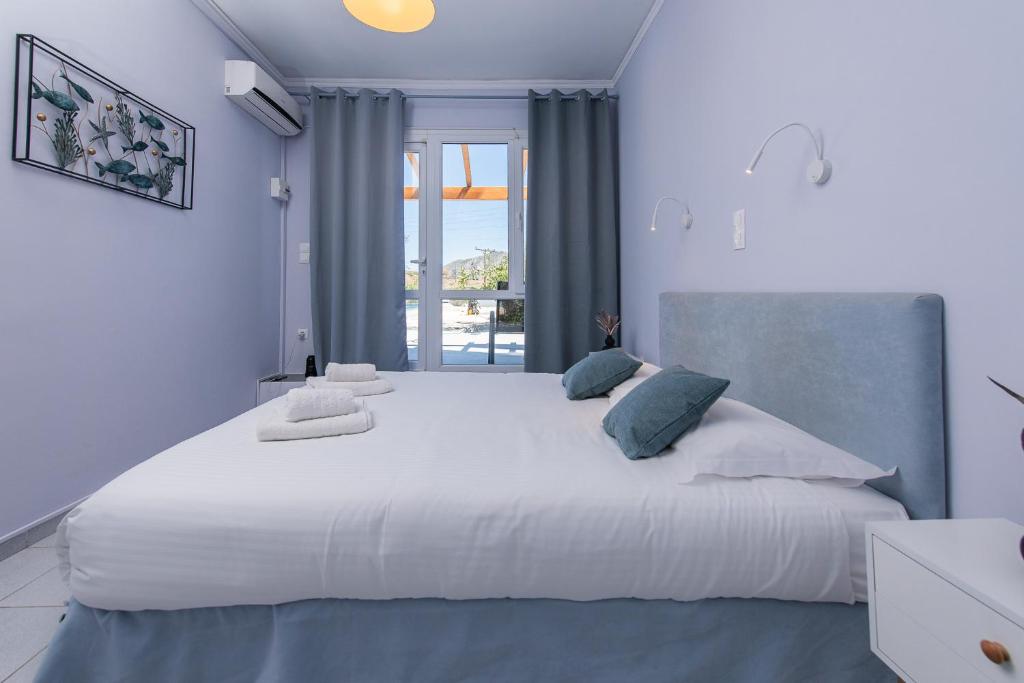 Postel nebo postele na pokoji v ubytování GIN Wellness Hotel
