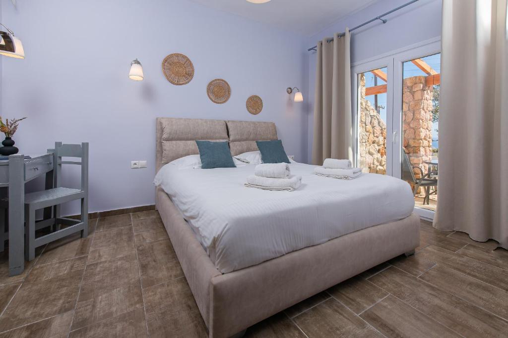 Postel nebo postele na pokoji v ubytování GIN Wellness Hotel