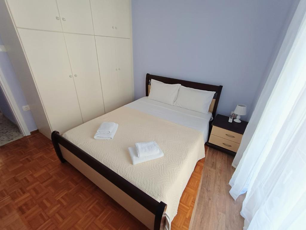 Posteľ alebo postele v izbe v ubytovaní Nick's Apartment · Corfu Center