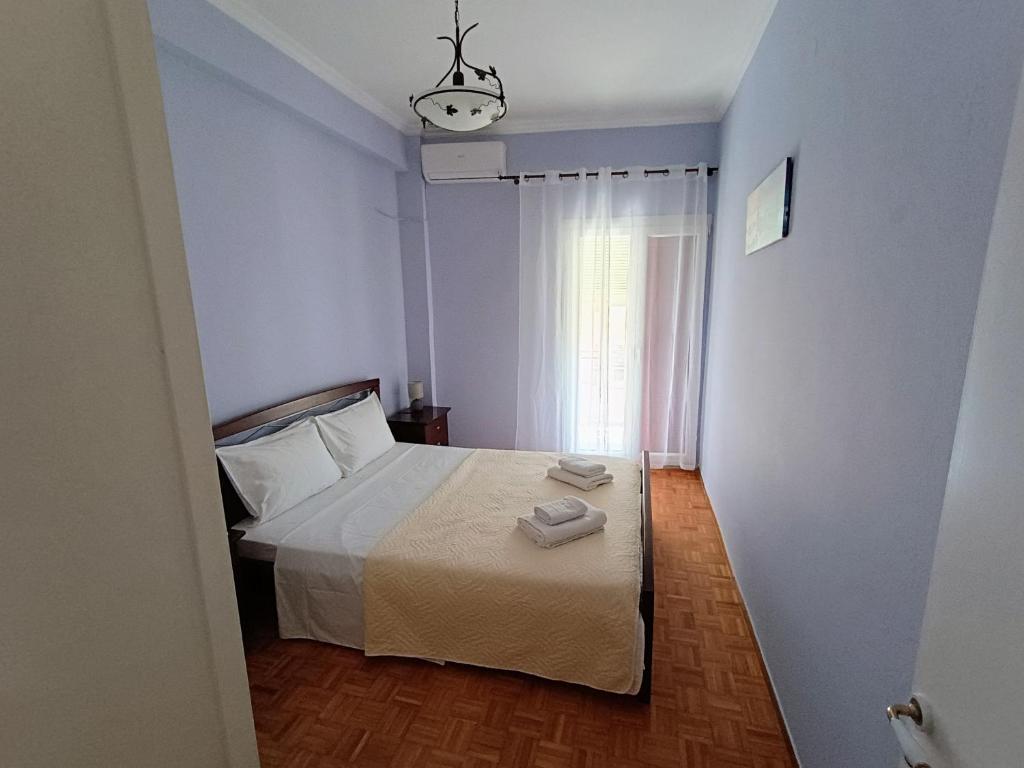 Posteľ alebo postele v izbe v ubytovaní Nick's Apartment · Corfu Center