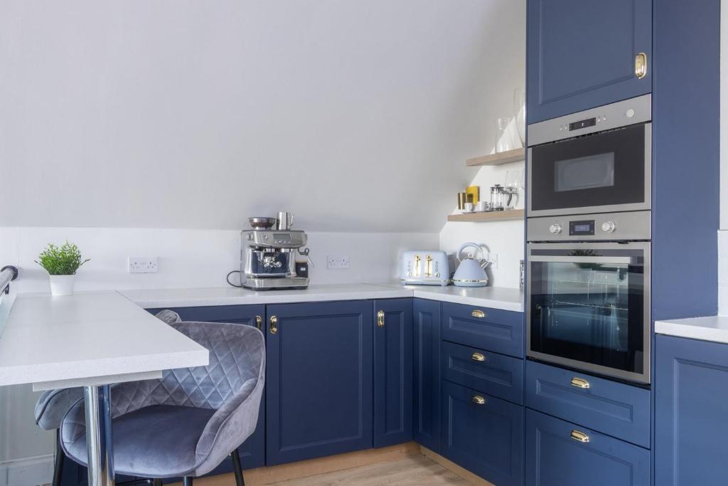 Kuchyň nebo kuchyňský kout v ubytování GuestReady - Modernised cottage in Monkstown
