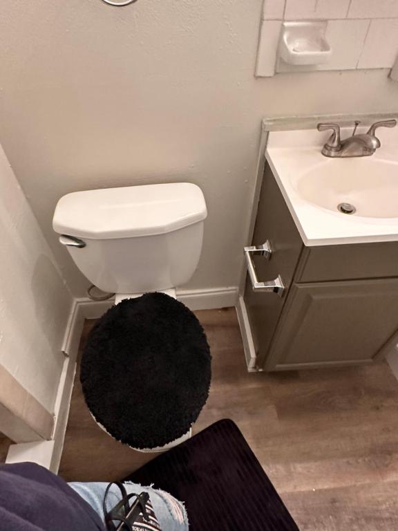 Um banheiro em Next level properties