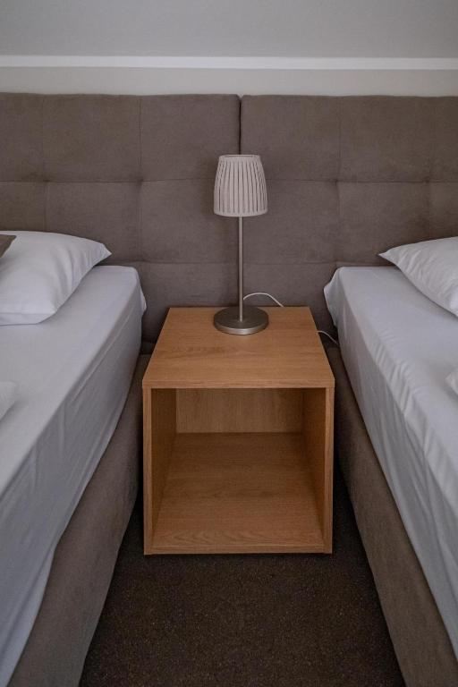 Postel nebo postele na pokoji v ubytování Relax Hotel Stork