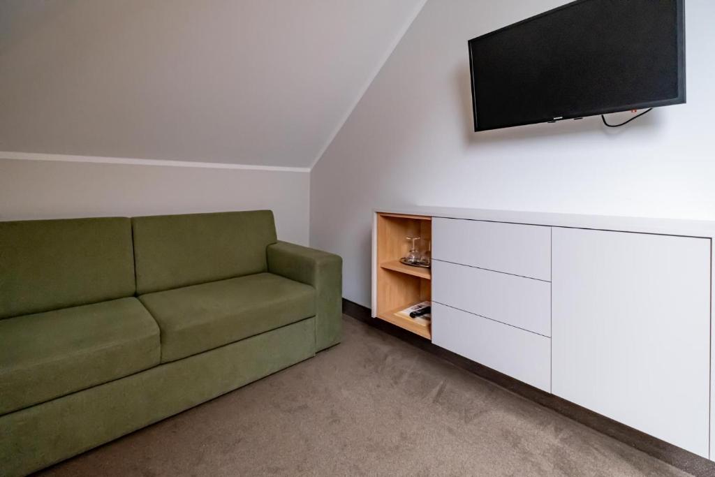 TV a/nebo společenská místnost v ubytování Relax Hotel Stork