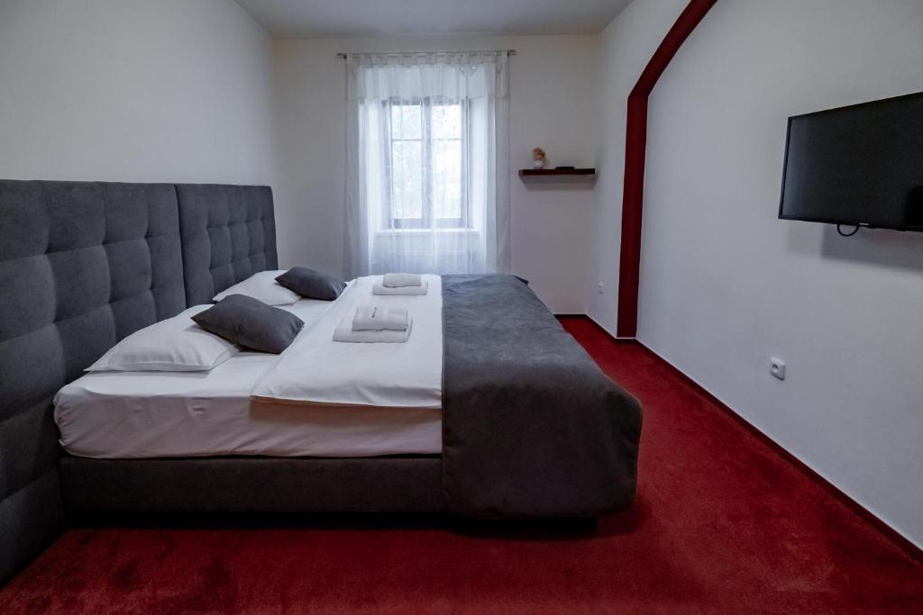 Postel nebo postele na pokoji v ubytování Relax Hotel Stork