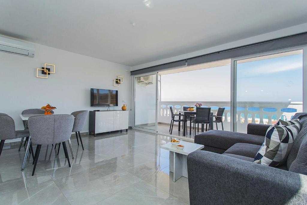 Televízia a/alebo spoločenská miestnosť v ubytovaní 131 Sea Dream - Alicante Holiday