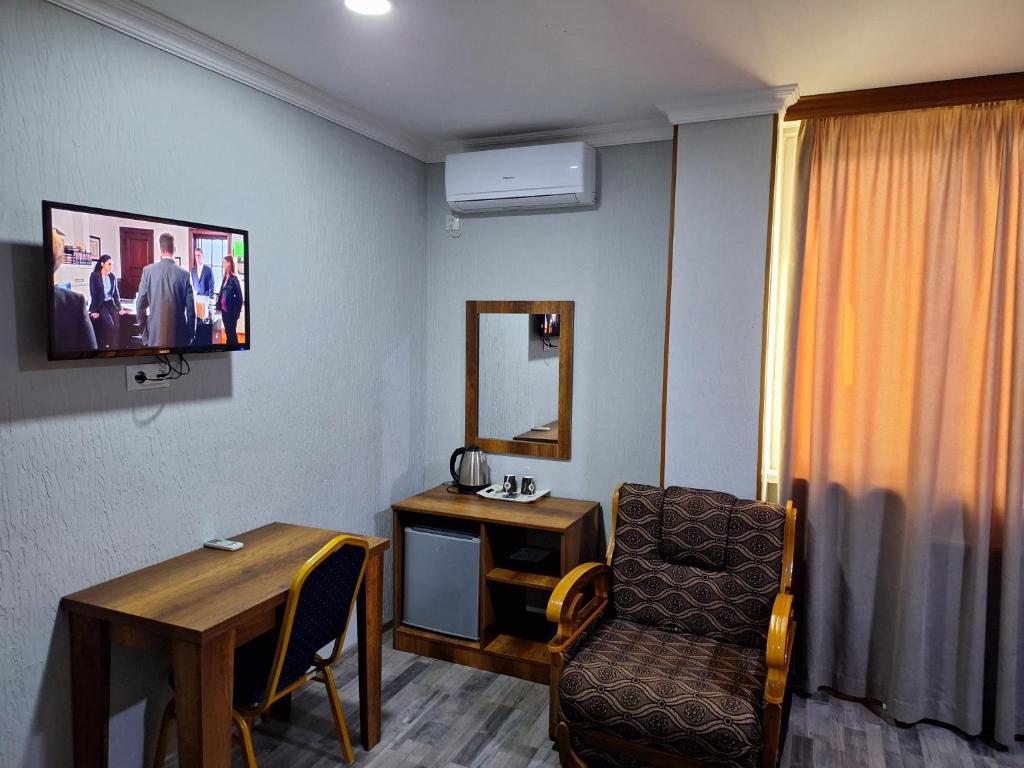 TV a/nebo společenská místnost v ubytování Hotel Georgian