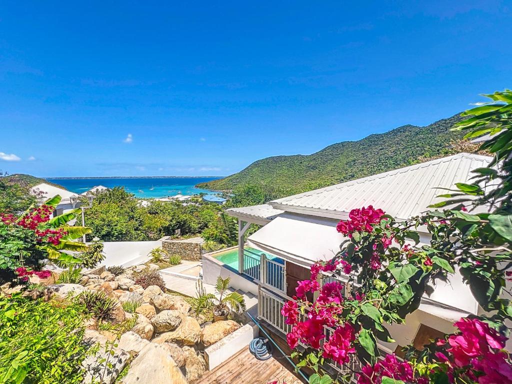 an aerial view of a house with flowers at Villa Romane private pool breathtaking sea view in Anse Marcel 
