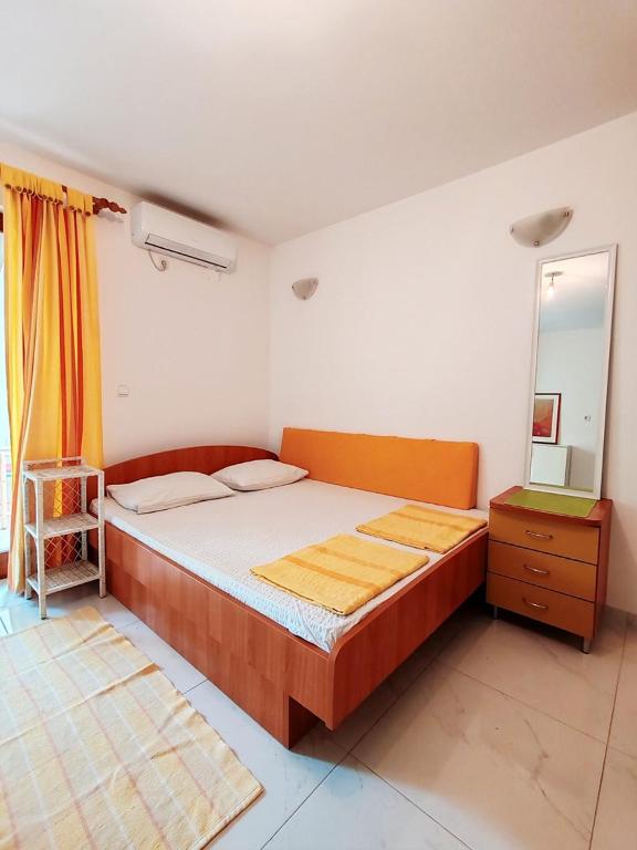 Postel nebo postele na pokoji v ubytování Apartments & Rooms Verse