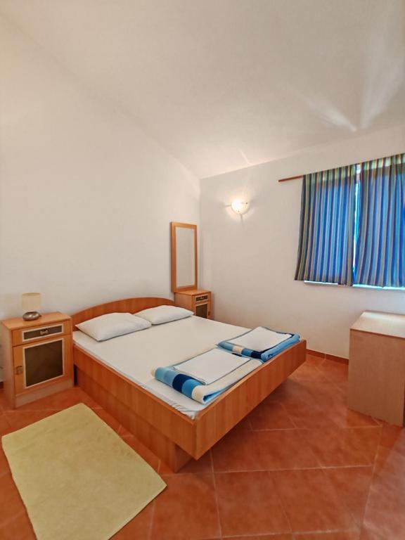 Postel nebo postele na pokoji v ubytování Apartments & Rooms Verse
