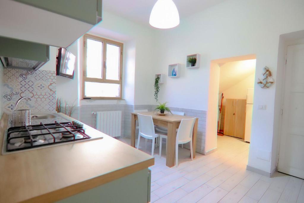 Kuchyňa alebo kuchynka v ubytovaní Holidayhouse Ostia - Libeccio