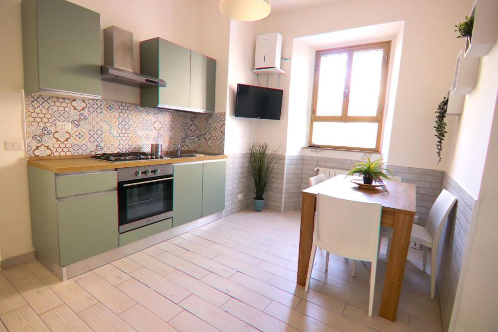 Kuchyňa alebo kuchynka v ubytovaní Holidayhouse Ostia - Libeccio