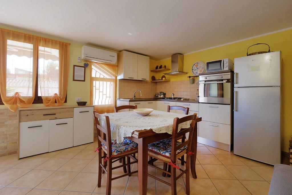 Kuchyň nebo kuchyňský kout v ubytování Vacanze Mare Teulada