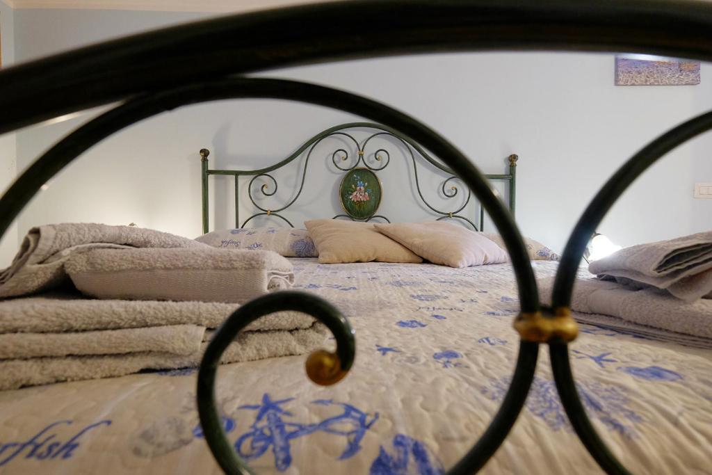 Postel nebo postele na pokoji v ubytování Vacanze Mare Teulada