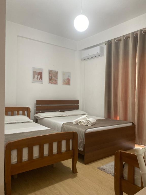 Voodi või voodid majutusasutuse Vila M Vera Rooms with kitchen and Apartments toas