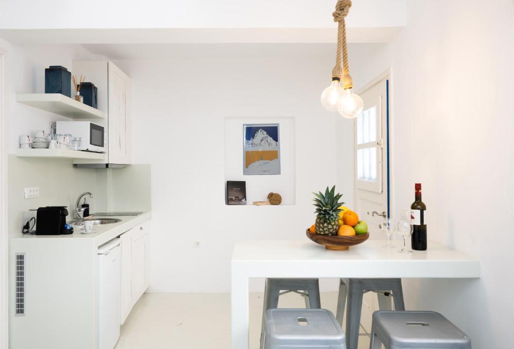 Kuchyň nebo kuchyňský kout v ubytování Hyades - Downtown Suites, Mykonos Town