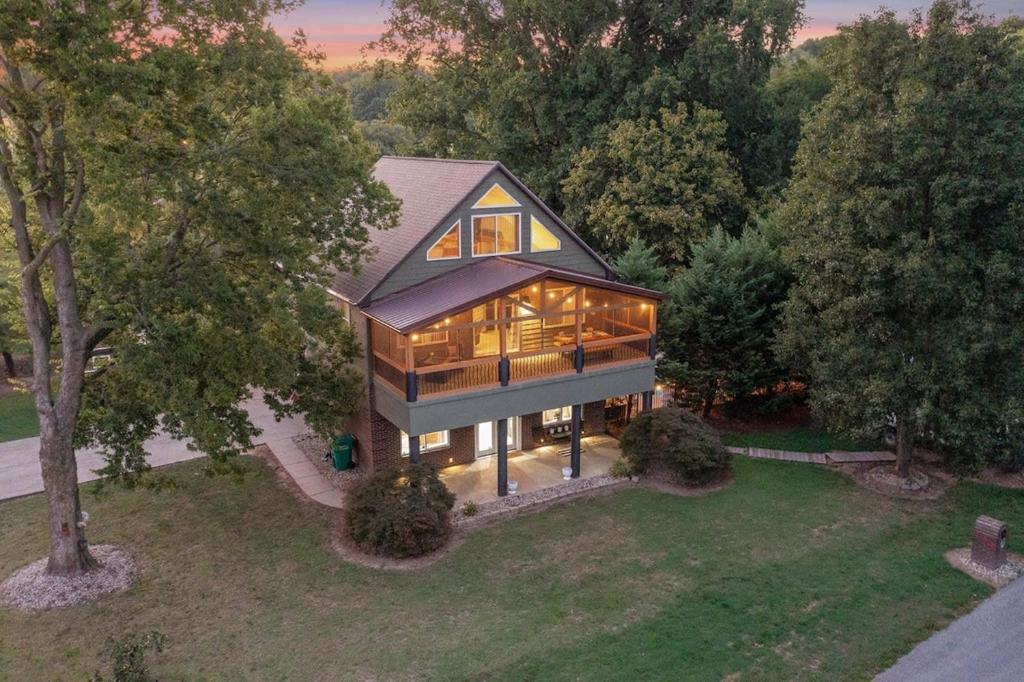 an overhead view of a house with a lot of windows at Rock and Roll River House in Jeffersonville