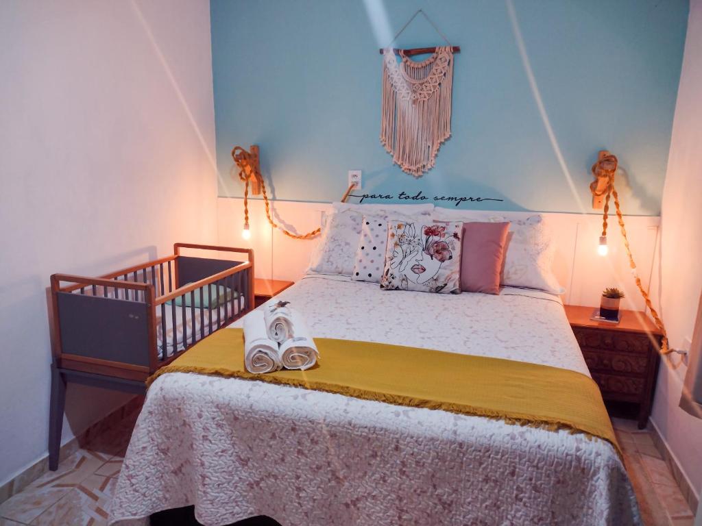 Säng eller sängar i ett rum på Casa de Campo Capixaba