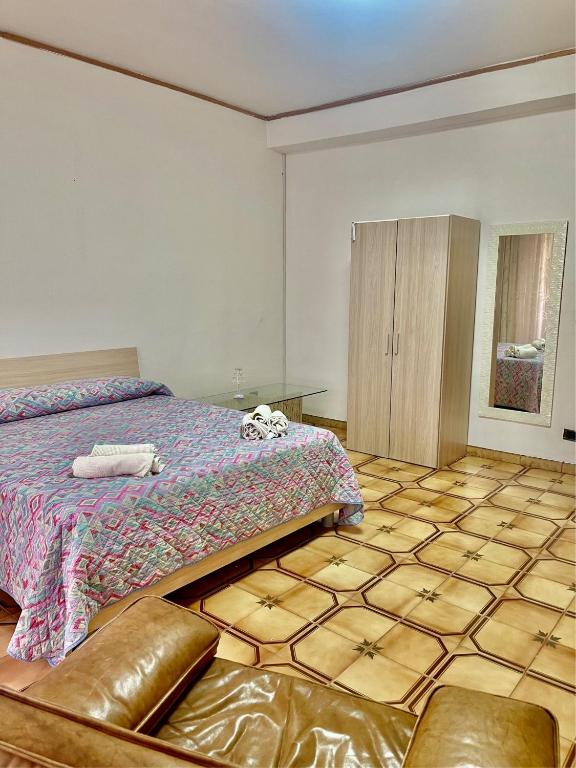 A bed or beds in a room at Rosa's house