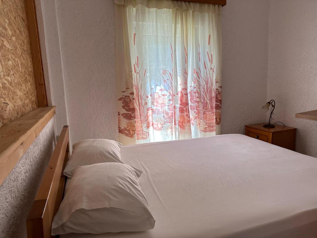 Postel nebo postele na pokoji v ubytování Studios Crete