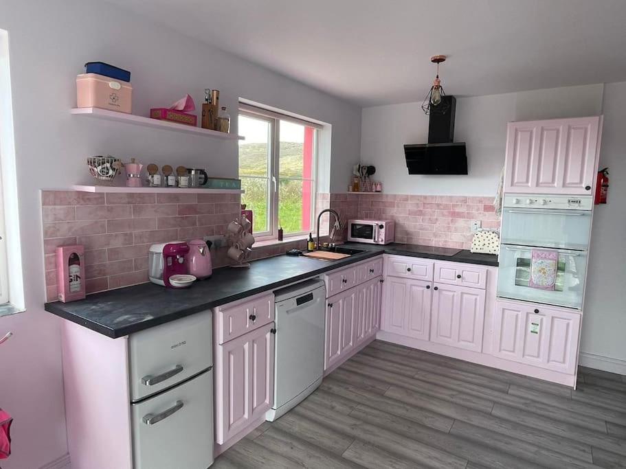 Kuchyň nebo kuchyňský kout v ubytování Casa Rosa