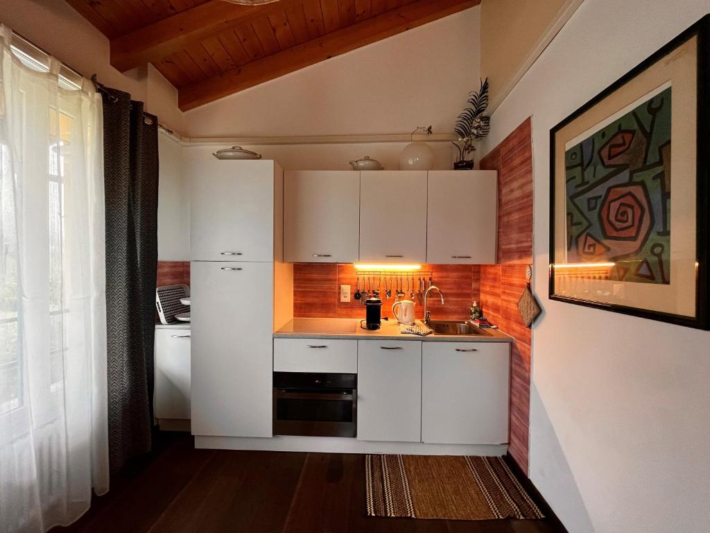 Kuchyň nebo kuchyňský kout v ubytování B&B Romantico Palazzo dei Ulivi