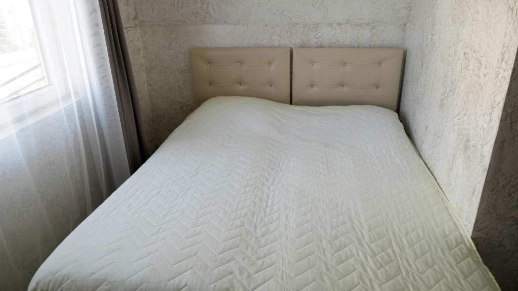 Postel nebo postele na pokoji v ubytování Mariam Hotel