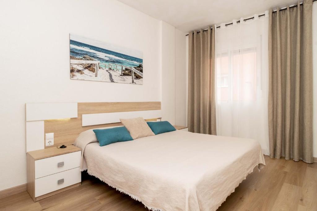 Posteľ alebo postele v izbe v ubytovaní Jose Hurtado Apartamento